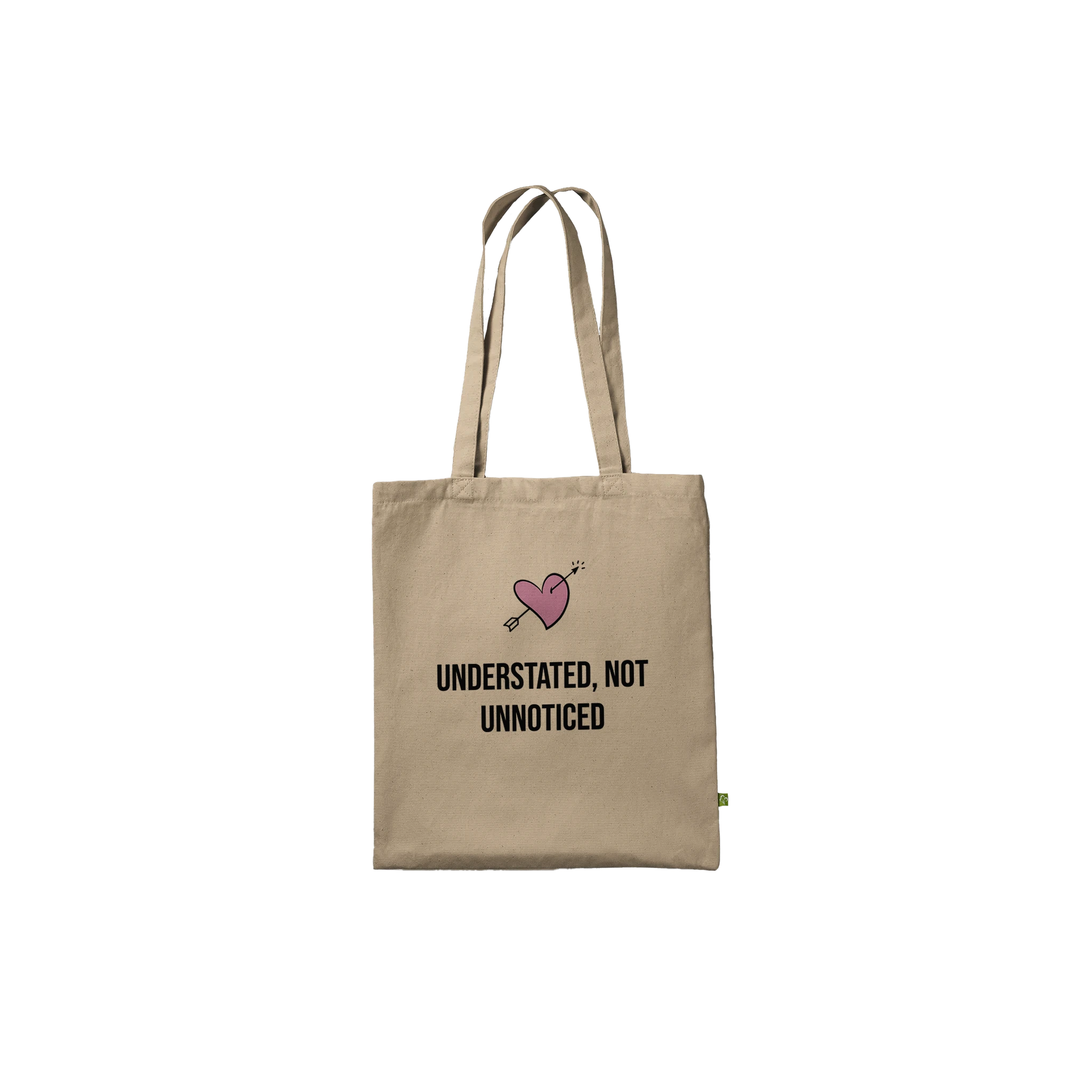 Reinforced cotton tote bag with the phrase 'Understated, Not Unnoticed'